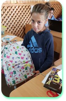  Ștefania 8 years, the new comer(received a schoolbag)